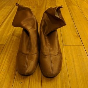 Rose gold booties.